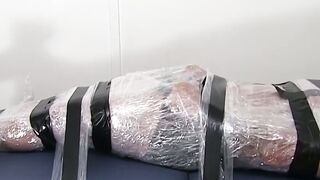 Restrained hunk endures tickling torment from his dom