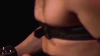 Man with muscles is restrained while only in his underwear