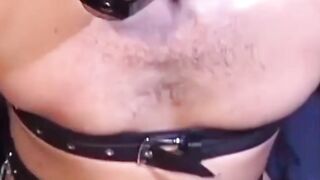 Man with muscles is restrained while only in his underwear