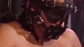 Man with muscles is restrained while only in his underwear