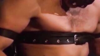 Man with muscles is restrained while only in his underwear