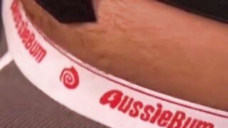 Man with muscles is restrained while only in his underwear