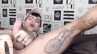 Tattooed amateur Mickey Taylor dildo fucks himself and cums