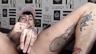 Tattooed amateur Mickey Taylor dildo fucks himself and cums