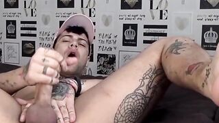 Tattooed amateur Mickey Taylor dildo fucks himself and cums