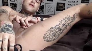 Tattooed amateur Mickey Taylor dildo fucks himself and cums