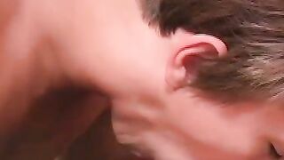 Two horny guys naked and sucking their dicks on the sofa