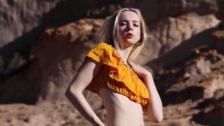 ravishing blonde bombshell Emmi Grand Obliterates All Dress Codes in Sizzling Outdoor Strip Tease Extravaganza