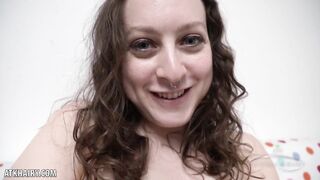 Delphine rubs and finger bang her hairy clit