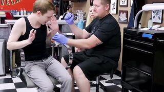 Horny blonde Natasha James rides a big cock during a tattoo session with young Matthe