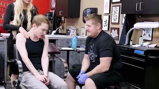 Horny blonde Natasha James rides a big cock during a tattoo session with young Matthe