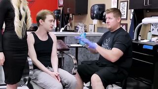 Horny blonde Natasha James rides a big cock during a tattoo session with young Matthe