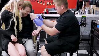 Horny blonde Natasha James rides a big cock during a tattoo session with young Matthe