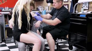 Horny blonde Natasha James rides a big cock during a tattoo session with young Matthe