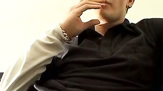 Bad stud Tomy chainsmoke his red cig while jerking on the couch