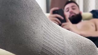 Giant guy Maui lays on the couch showing his smooth size fifteen feet