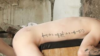 Tattooed Slave Noah Carter Gets Brutally Bangs His Masters Enormous Dick on a Wooden Log