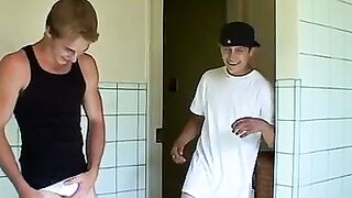 Kelly Cooper and Grant Hiller in a full strip wrestle match