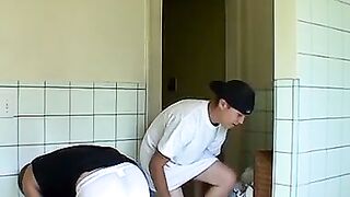 Kelly Cooper and Grant Hiller in a full strip wrestle match