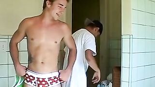 Kelly Cooper and Grant Hiller in a full strip wrestle match