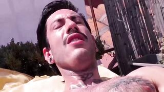 Slim Alexis Clark jacked his gigantic cock while working on his tan on the rooftops