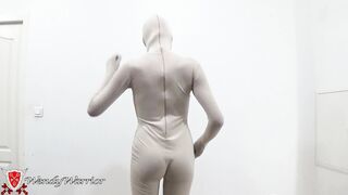 Putting on a Leotard over a Padlocked Zentai