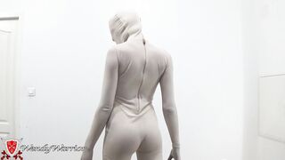 Putting on a Leotard over a Padlocked Zentai
