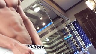 Masked muscular hunk masturbates his big long cock