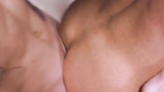 Tattooed jock gives handjob to his lover during bareback