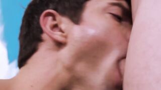 Tattooed jock gives handjob to his lover during bareback