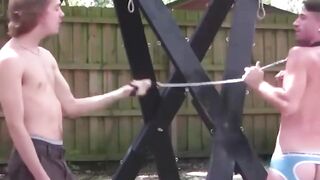 "Dominant Partner Whips Submissive Teen in Intense BDSM Scene"