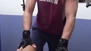 "Sweaty Muscle Rivals Face Off in Bathroom Boxing Match"