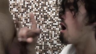 Shaggy young man paid to suck big cock at public bathhouse