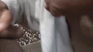 Shaggy young man paid to suck big cock at public bathhouse