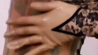 Masked babe in stockings spreads legs for solo masturbation