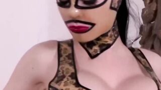 Masked babe in stockings spreads legs for solo masturbation