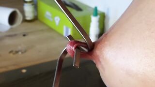 Stretching my XXL Pierced Nipples