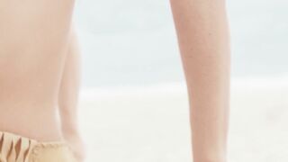 "Petite Aussie Milf Stripping on Beach - Exotic Dancer Unleashed"