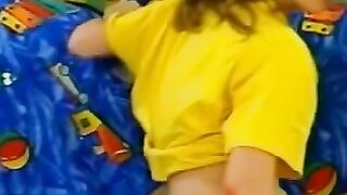 Petra having fun with a yellow toy