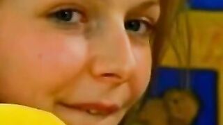 Petra having fun with a yellow toy