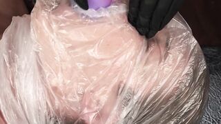 Petite dominatrix Arson Leigh is pegging and tormenting bound stud