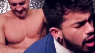 Two men in suits have sex in the toilet at work