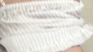 Young Japanese babe shares her couch masturbation session