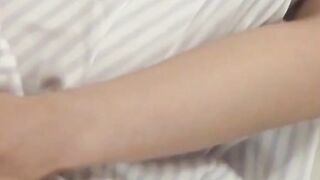 Young Japanese babe shares her couch masturbation session