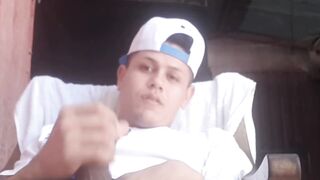 Outdoor wanking with sexy young Latino wearing baseball cap