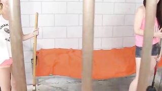 Prison Handjobs - Two Hot Babes Share A Convict's Dick