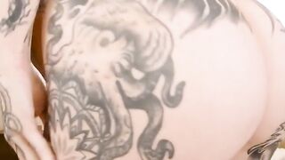 Nichole Sapphire's Ink-Filled Journey Through Body Art" or "Tatted Up Babe Gets Her Fix of Permanent Makeup