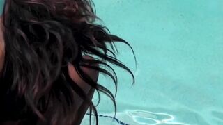 Petite Ebony Babe Shows Off Her Big Boobies Poolside