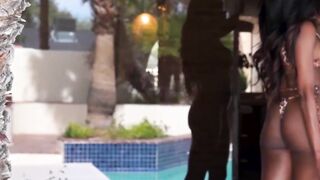 Petite Ebony Babe Shows Off Her Big Boobies Poolside