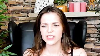 Brown-Haired Babe Masturbates in Front of Camera